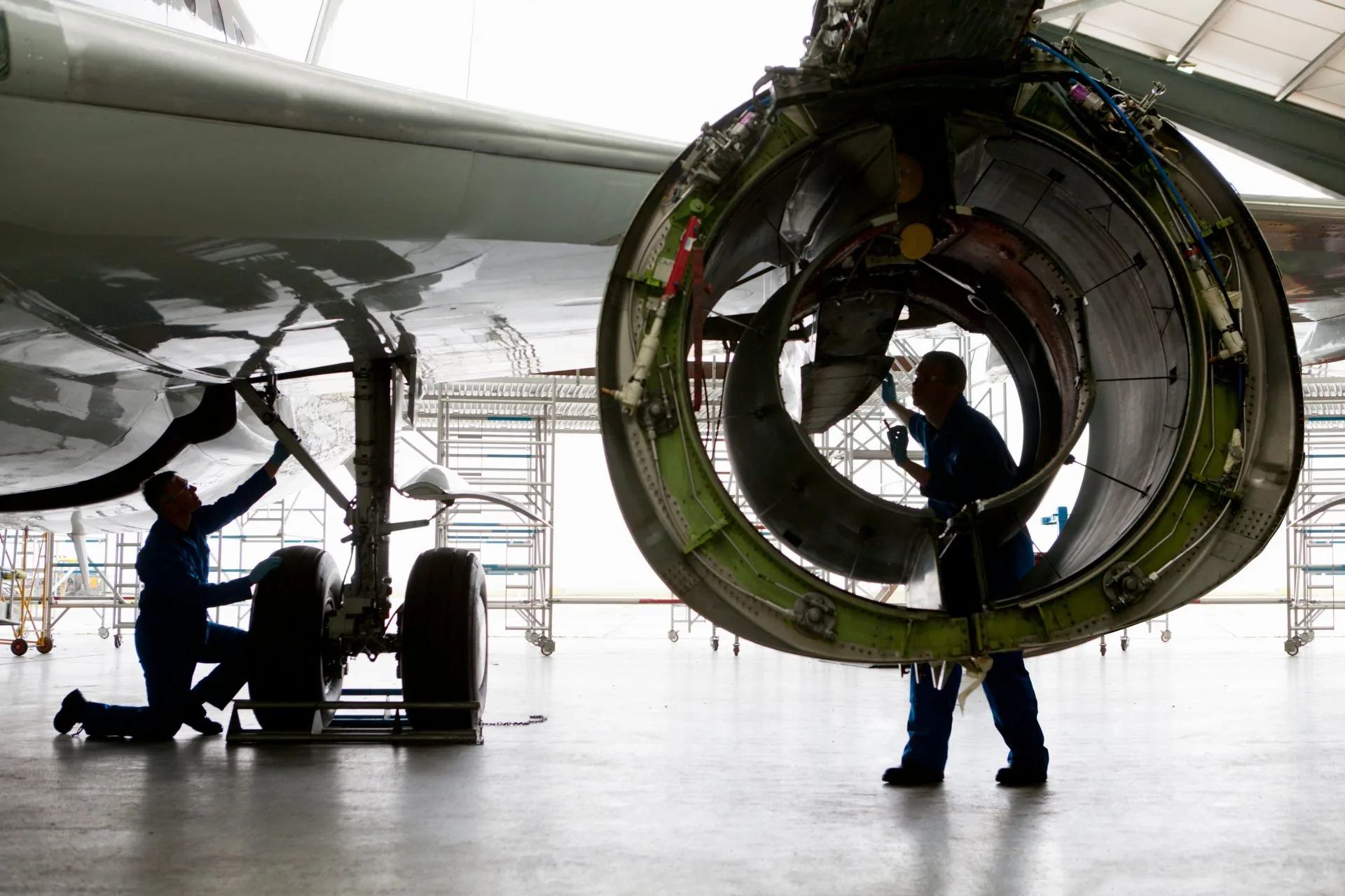 aircraft-maintenance-in-hangar-with-mechanics-