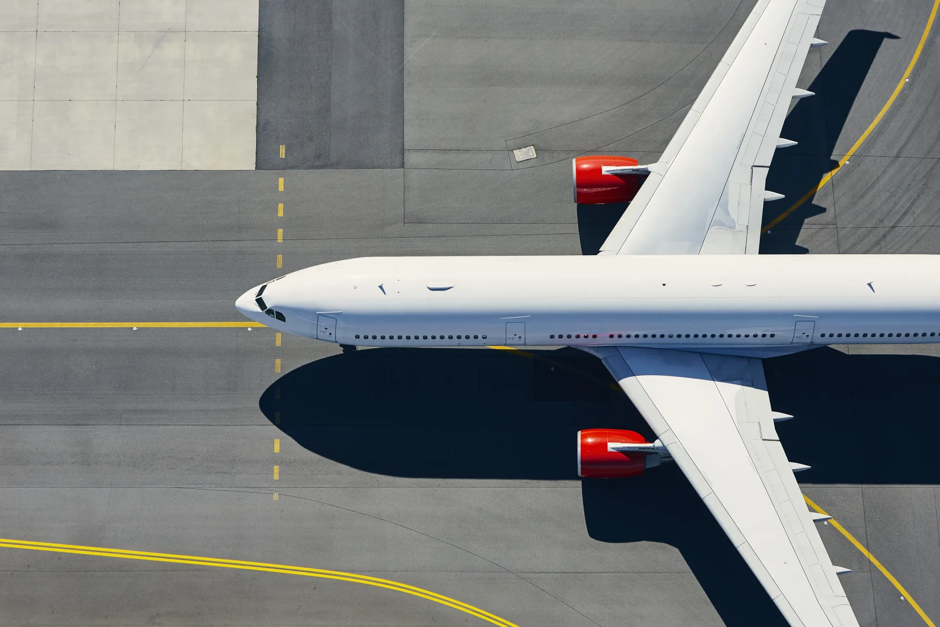 commercial-airplane-on-the-runway-from-above